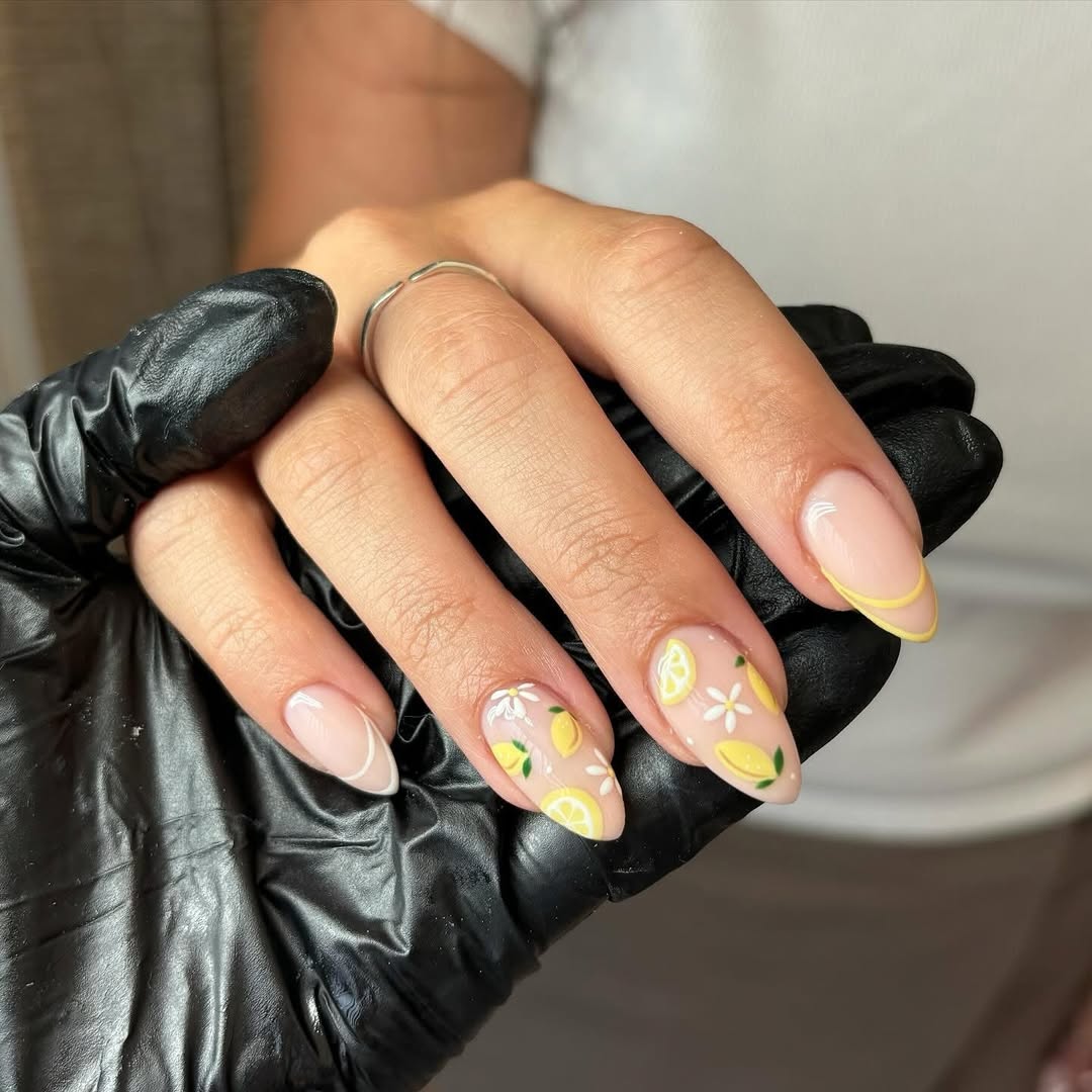 nude nails with yellow lemon design