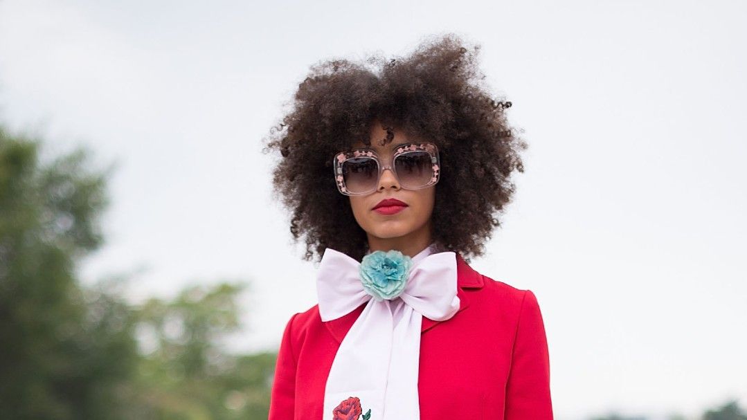 Singer Kelsey Lu poses wearing Gucci before the Gucci show during Milan Fashion Week Spring/Summer 2017 on September 21, 2016 in Milan, Italy.