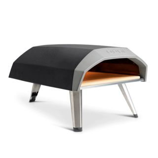 Grey Ooni Koda pizza oven with heat proof jacket and silver legs