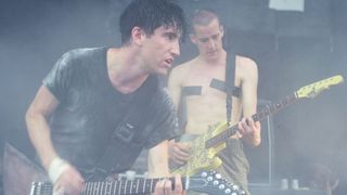 Photo of NINE INCH NAILS and Trent REZNOR and Richard PATRICK, Trent Reznor and Richard Patrick performing on stage.