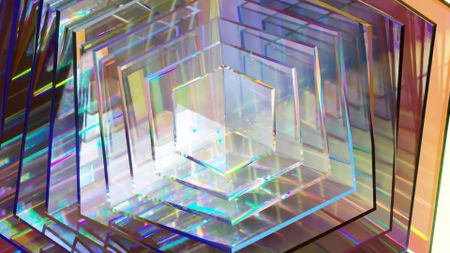 A series of hexagonal clear pieces, reflecting rainbow prisms