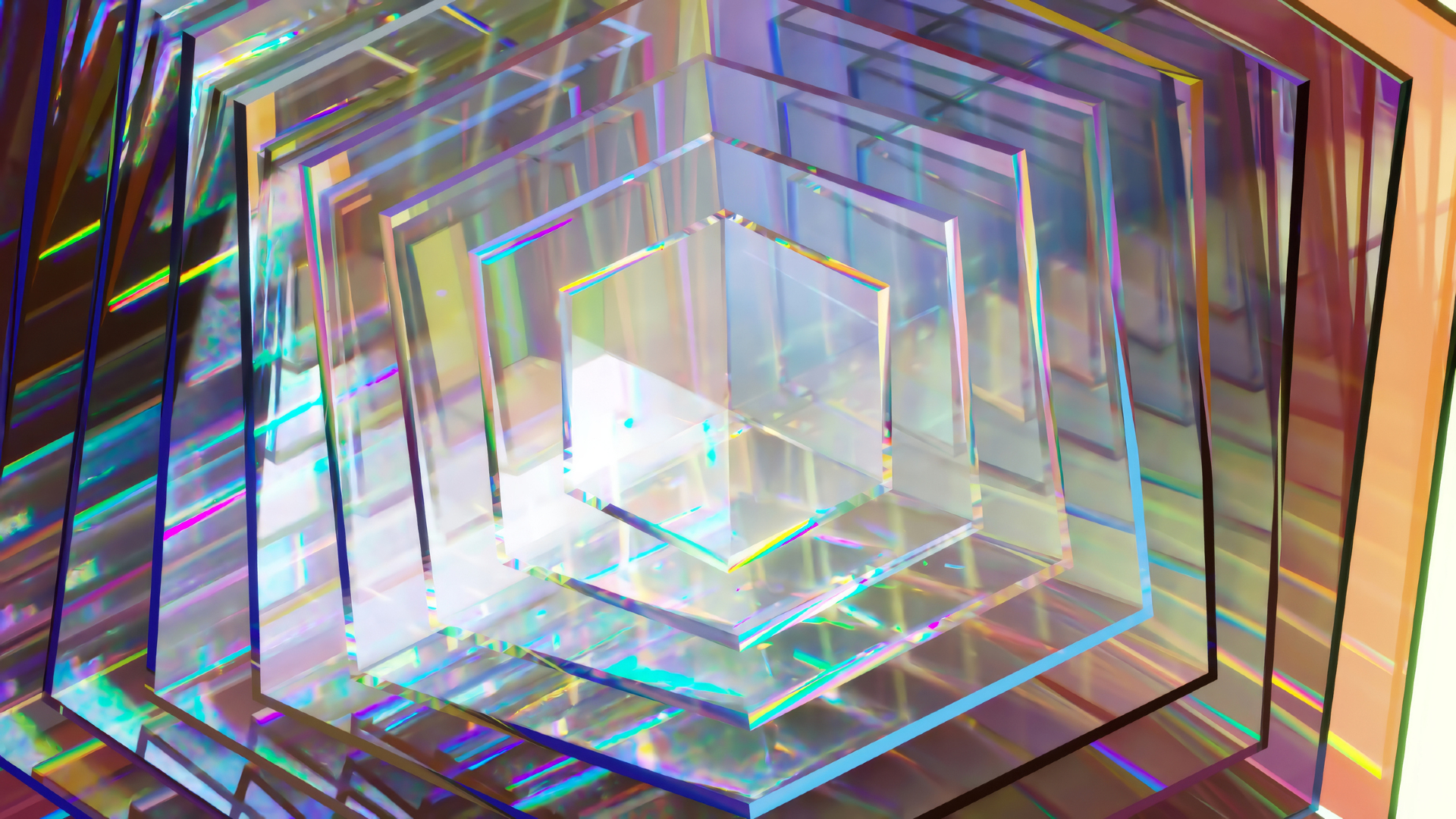 A series of hexagonal clear pieces, reflecting rainbow prisms