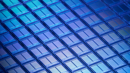Flash Memory Wafer Macro Detail - stock photo: Slash Memory Chips seen at 10x Macro Magnification in UV light.