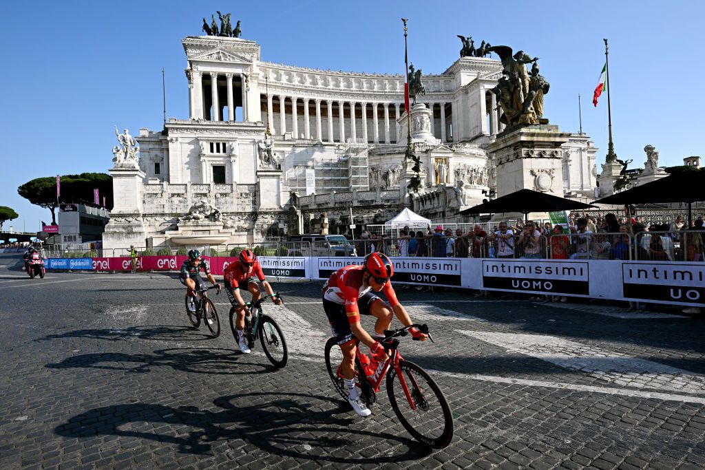 ROME ITALY MAY 28 LR Cesare Benedetti of Italy and Team BORA hansgrohe Maxime Bouet of France and Team Arka Samsic and Toms Skuji of Latvia and Team Trek Segafredo compete in the breakaway at the Piazza Venezia during the 106th Giro dItalia 2023 Stage 21 a 126km stage from Rome to Rome UCIWT on May 28 2023 in Rome Italy Photo by Stuart FranklinGetty Images
