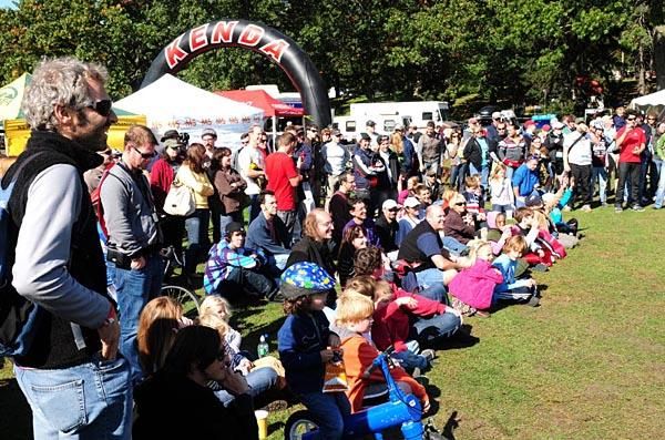 Spectators gather for a stunt show just before the women's race.