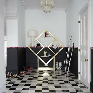 hallway with vinyl flooring and white lamp