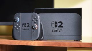 Nintendo Switch 2 console on table in front of a TV