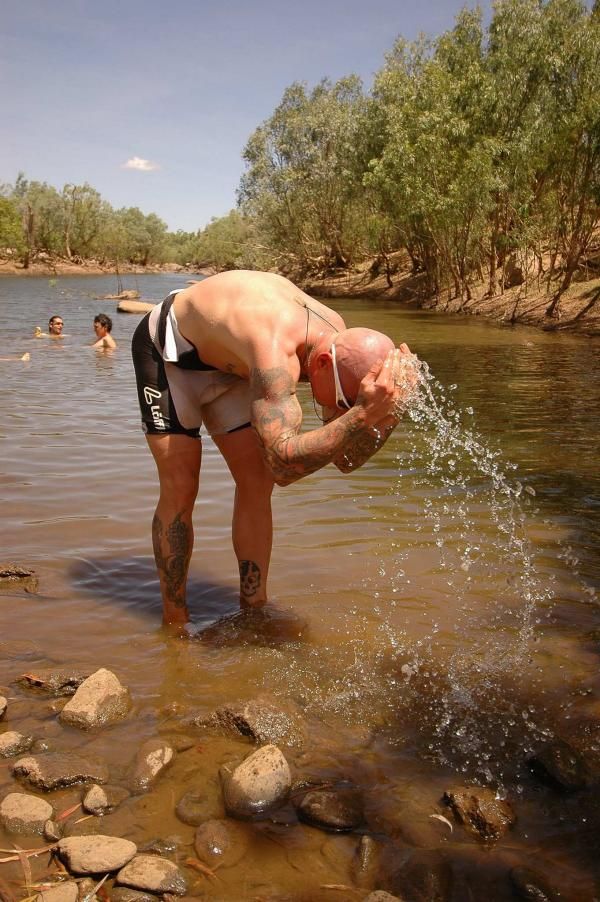 Franz Preihs cools off in a billabong.