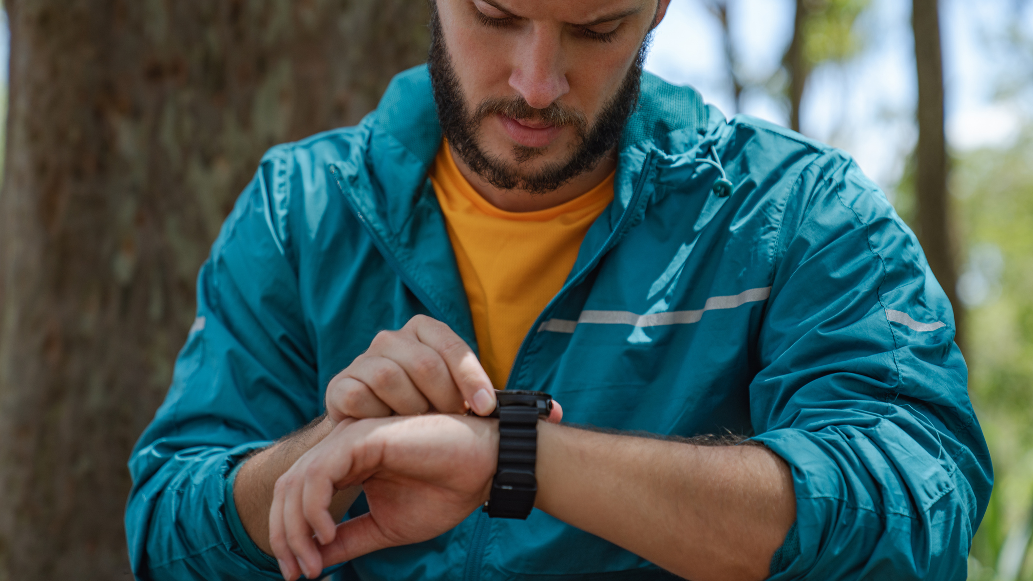Man looks at watch