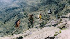 Klattermusen FW25 Hiking Collection in use in the mountains