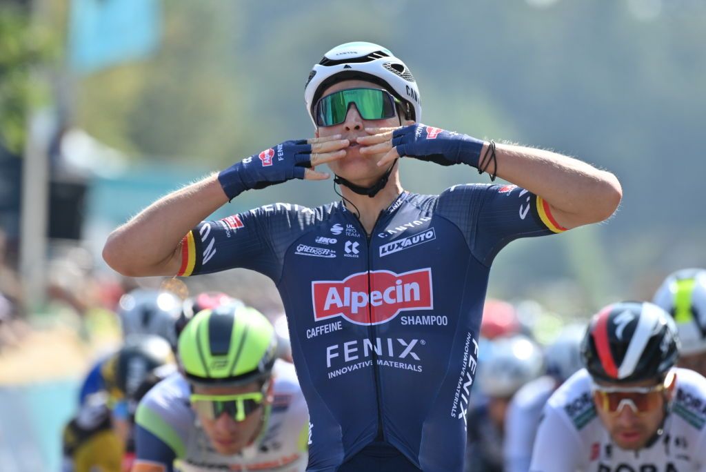 Belgian Tim Merlier of AlpecinFenix celebrates as he crosses the finish line to win stage four of the Benelux cycling tour from Aalter to Ardooie 1661 km Thursday 02 September 2021BELGA PHOTO DAVID STOCKMAN Photo by DAVID STOCKMANBELGA MAGAFP via Getty Images