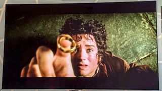 Frodo trying to catch The One Ring in The Lord of the Rings: The Fellowship of the Ring