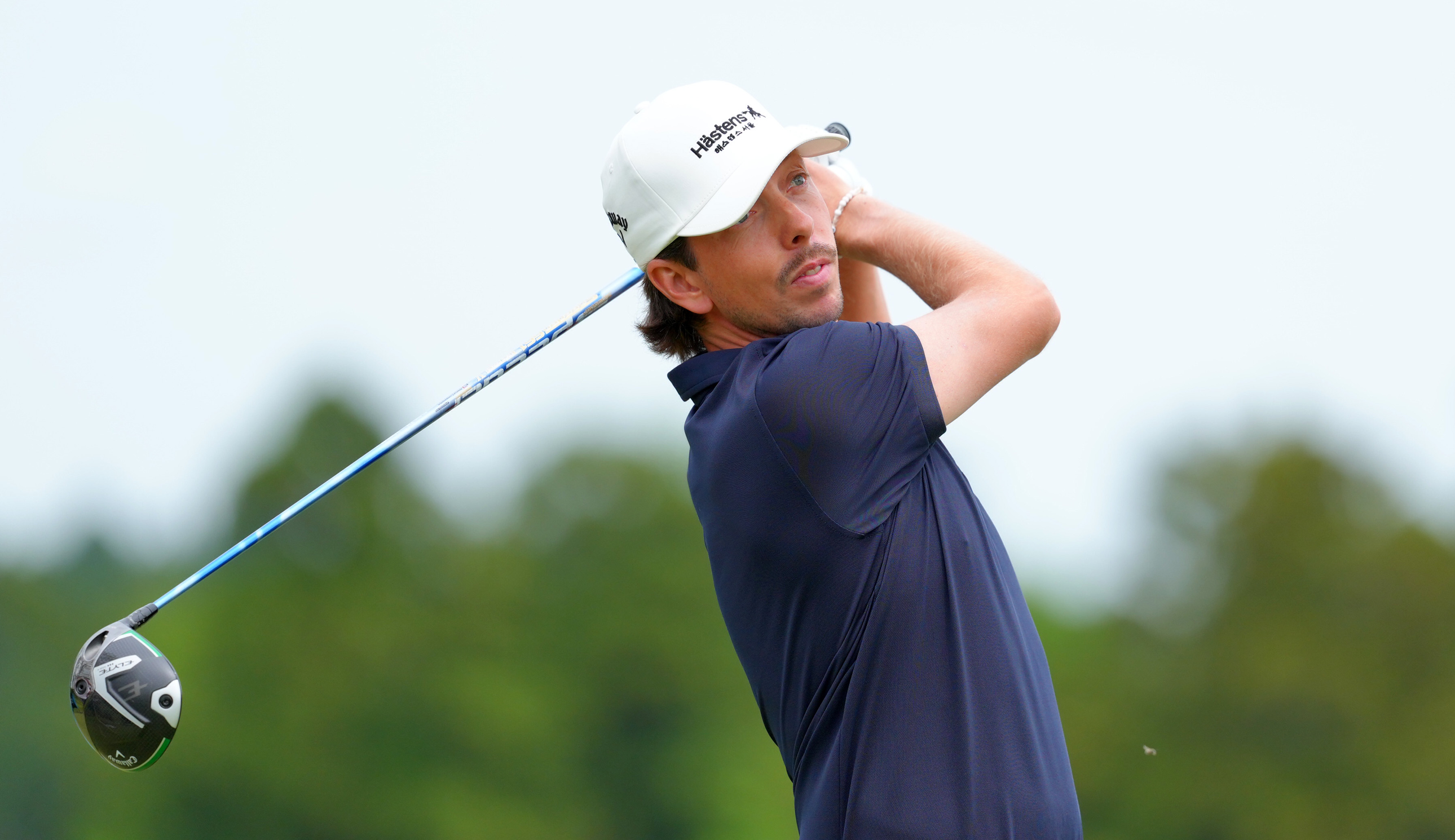 Bjorn Hellgren hits a driver off the tee