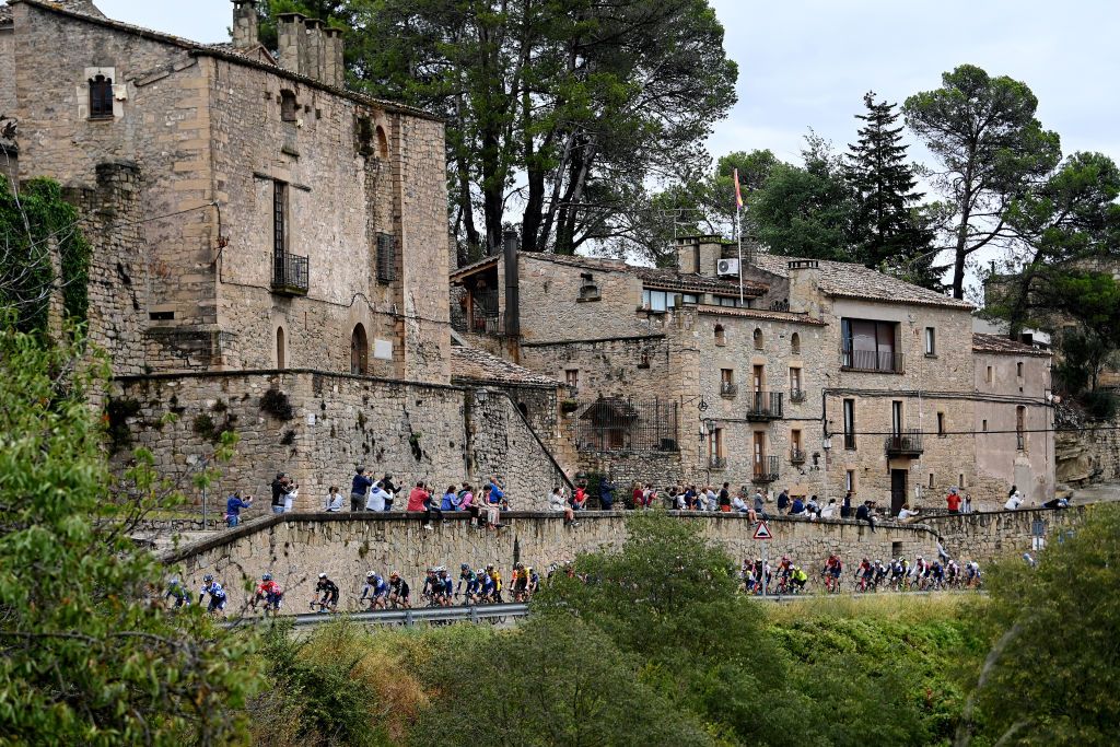 BARCELONA SPAIN AUGUST 27 A general view of the peloton passing through a landscape during the 78th Tour of Spain 2023 Stage 2 a 1818km stage from Matar to Barcelona UCIWT on August 27 2023 in Barcelona Spain Photo by Tim de WaeleGetty Images