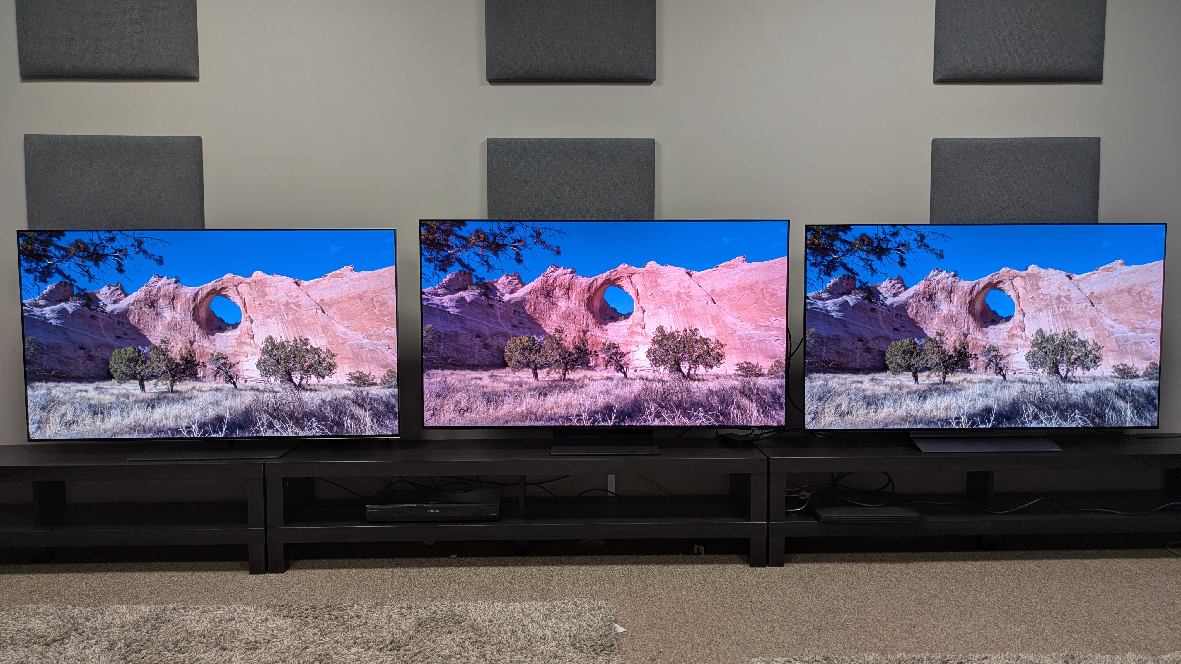 LG G5 (left) vs Samsung S95F (middle) vs LG C5 (right) showing a cliffside from a canyon on screen