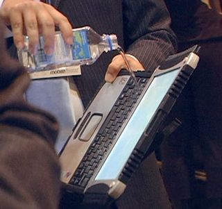 Panasonic reps wowed the crowds by pouring water on the laptops.