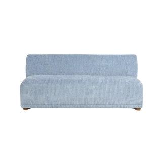 blue armless anthropologie sofa