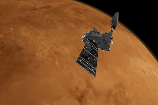 An artist's illustration of the ExoMars Trace Gas Orbiter circling the Red Planet.