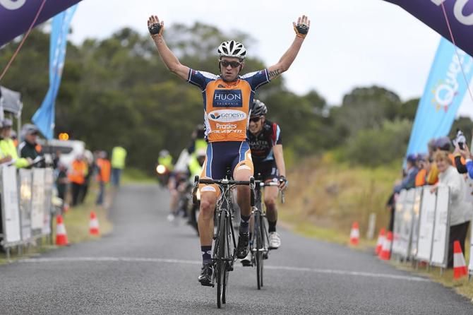 Nathan Earle (Huon Salmon-Genesys) wins Stage 2 ahead of Matt Clark (CharterMason Drapac Development) atop Bunya Mountains at the FKG Tour of Toowoomba