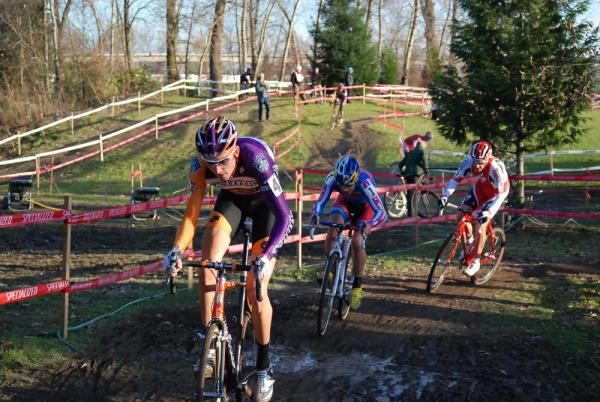 Trebon leads Johnson and Wells through the pits on the first lap.