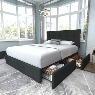 A dark grey storage bed with drawers that are open.