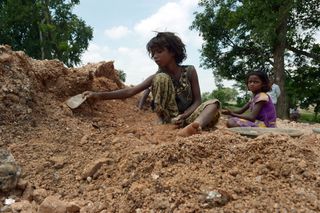 Children working on a mica mine in Jharkhand, India