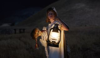 Annabelle: Creation a girl and her doll out for a walk