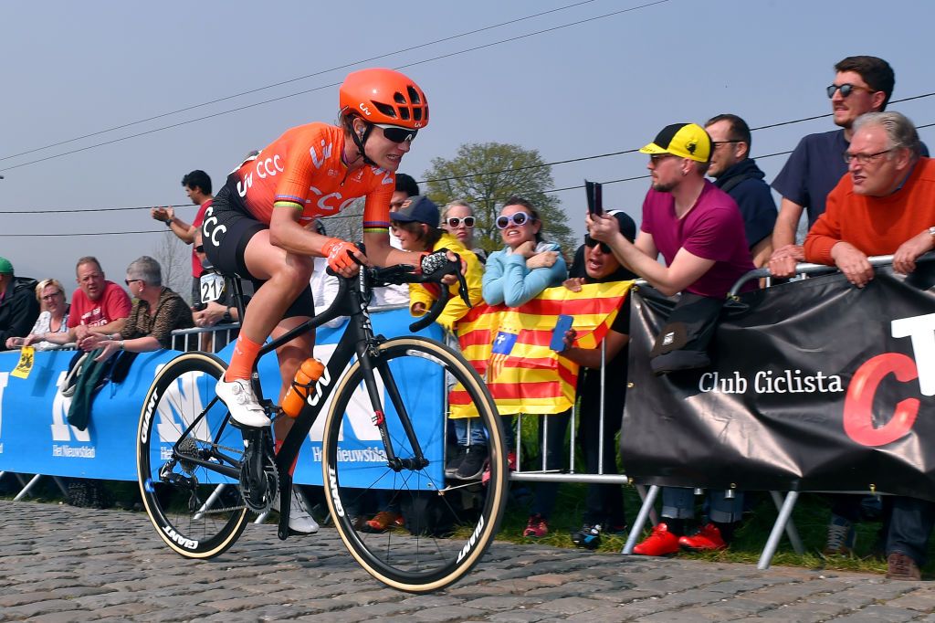 OUDENAARDE BELGIUM APRIL 07 Marianne Vos of The Netherlands and Team CCCLiv Cobblestones Public Fans during the 16th Tour of Flanders 2019 Ronde van Vlaanderen Women Elite a 1592km race from Oudenaarde to Oudenaarde RondeVlaanderen FlandersClassic RVV19 on April 07 2019 in Oudenaarde Belgium Photo by Luc ClaessenGetty Images