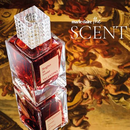 Valentino Anatomy of Dreams Sogno In Rosso Bottle sitting on a Roman painting