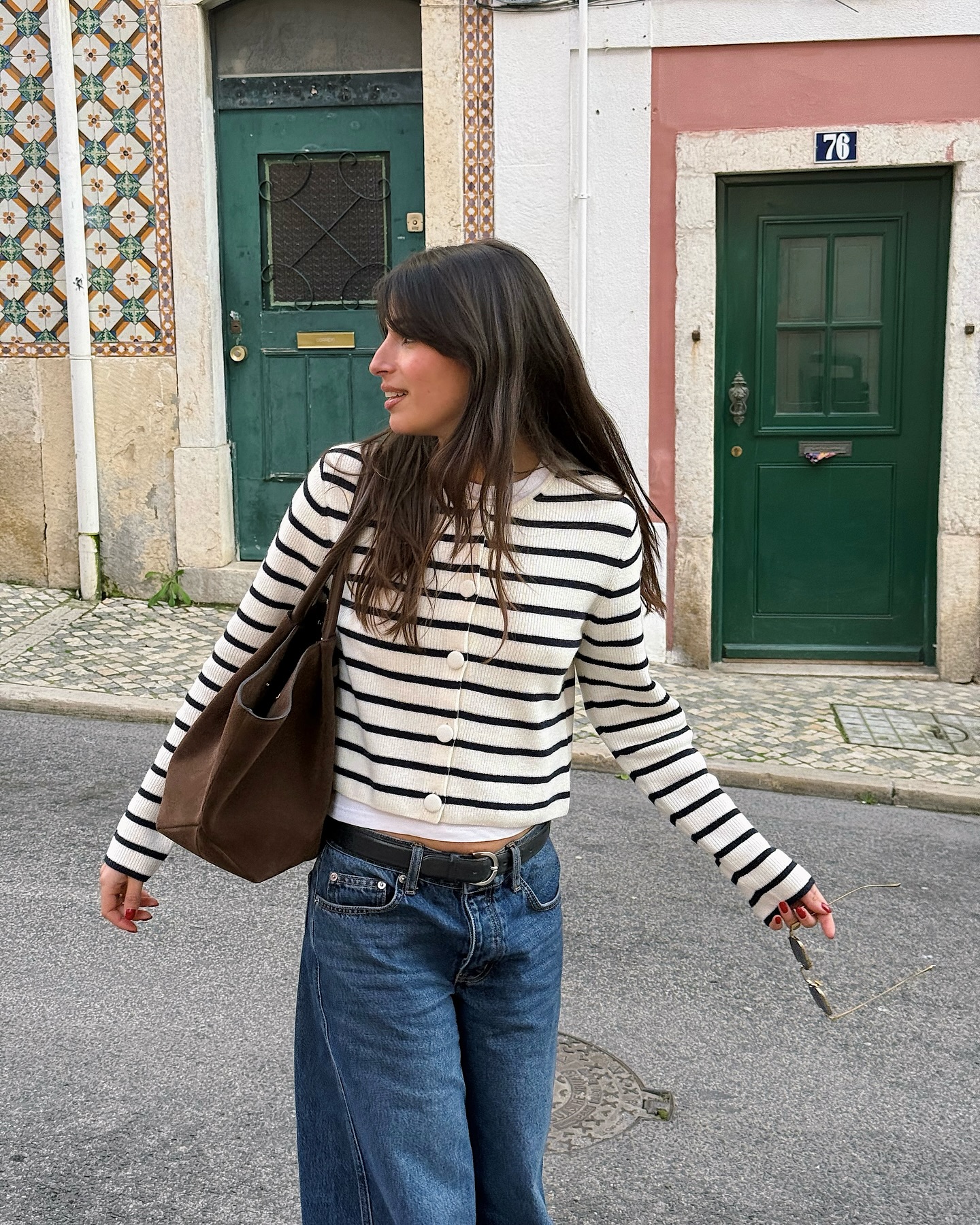 French influencer wears striped cardigan