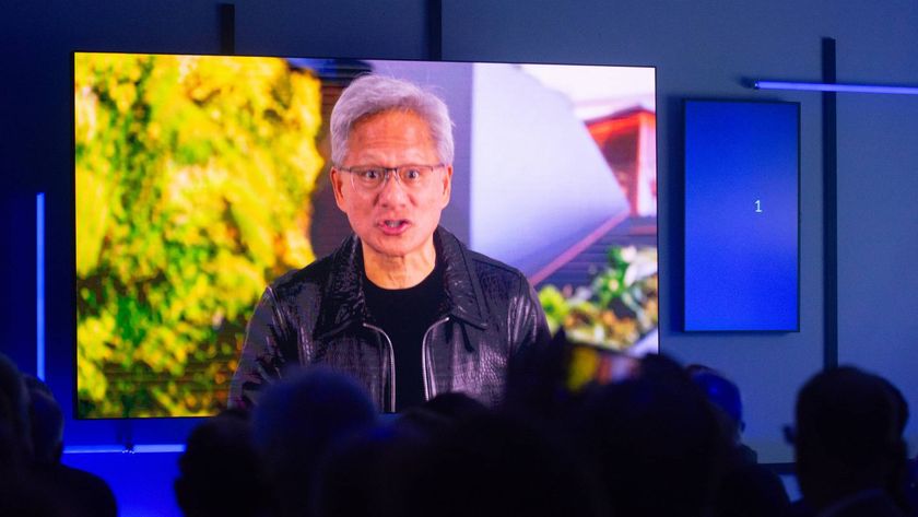 Jensen Huang on a screen talking to an audience