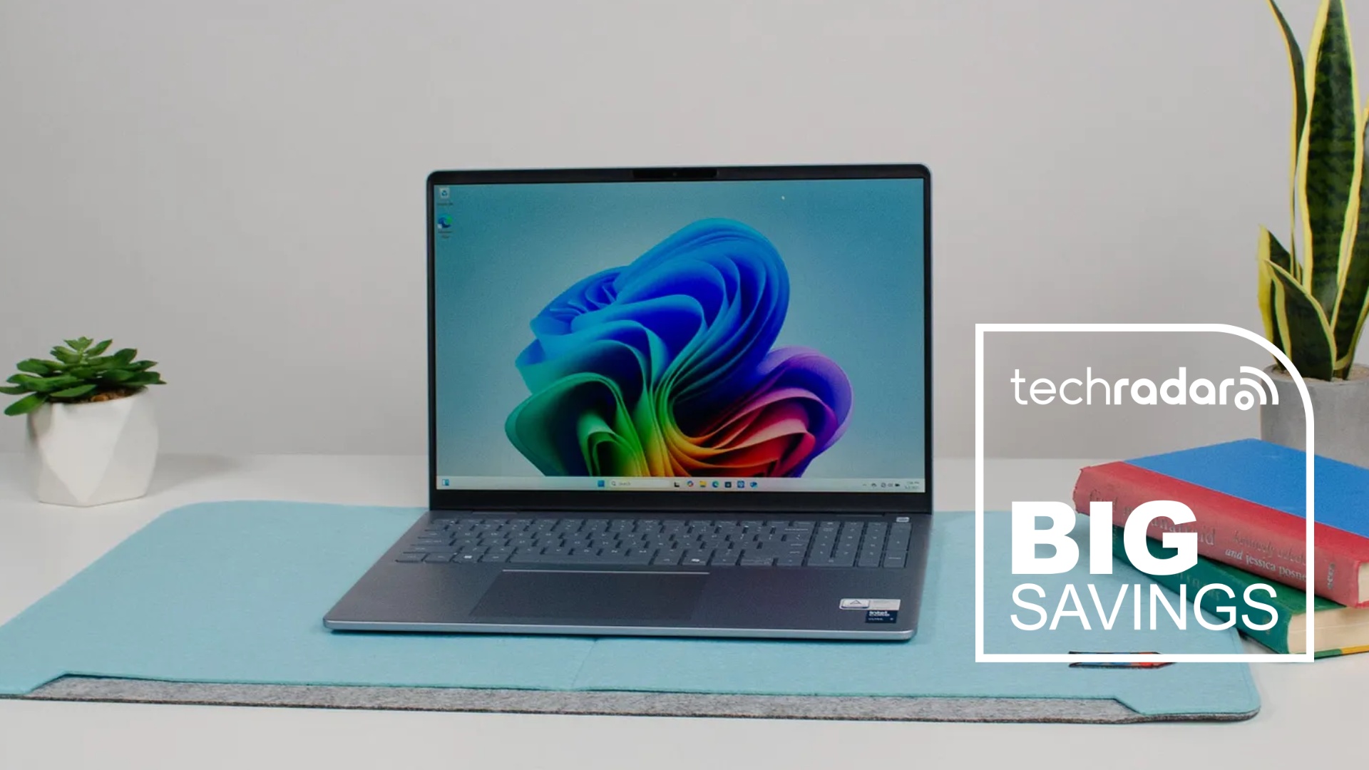 A Dell 16 Plus laptop in our office under review with a TechRadar badge that reads 'Big Savings'