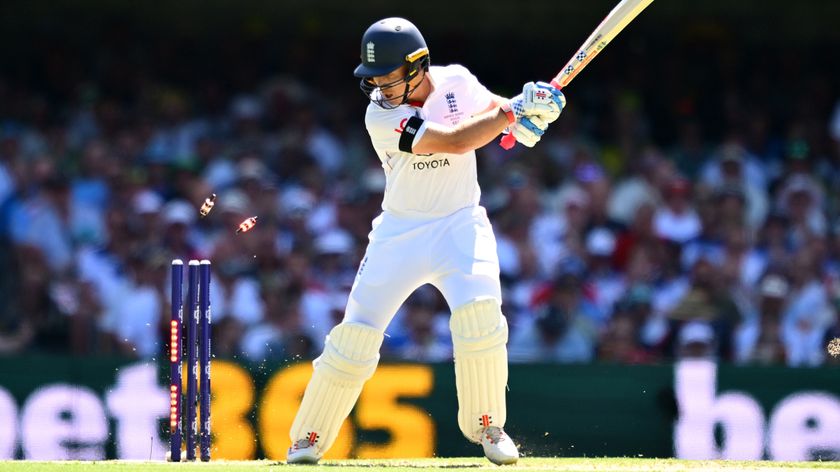 Ollie Pope of England is bowled by Mitchell Starc of Australia during day one of the Second 2025/26 Ashes Series Test Match between Australia and England at The Gabba on December 04, 2025 in Brisbane, Australia. 