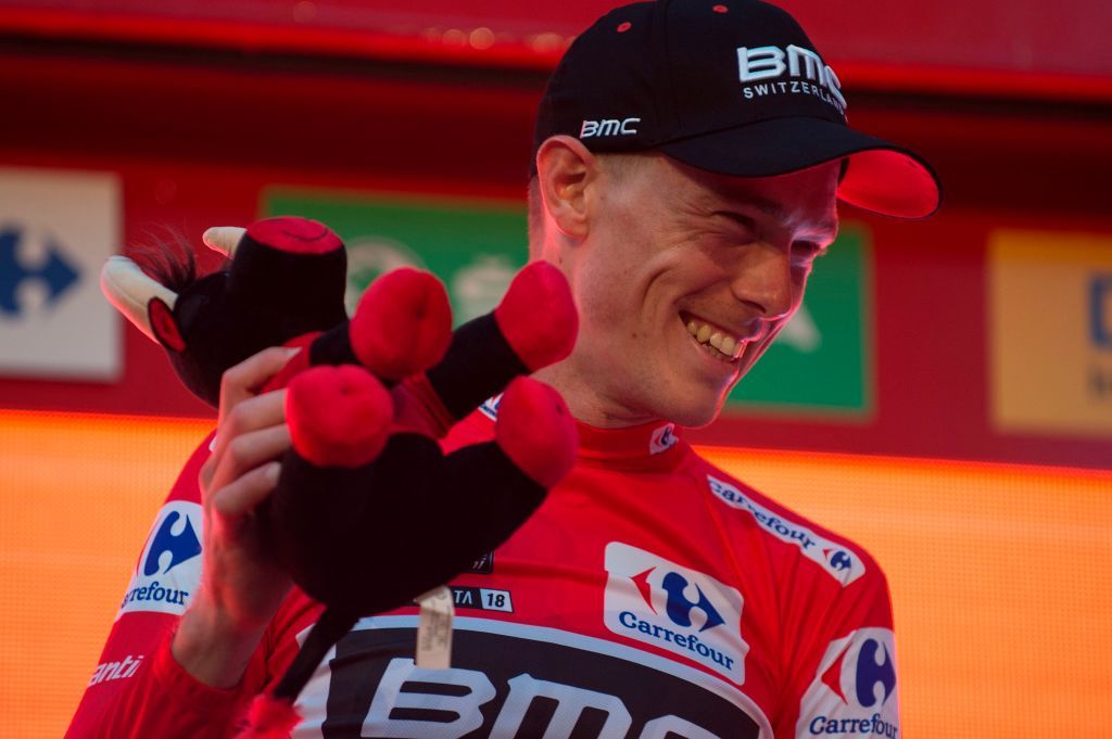 Rohan Dennis (BMC) celebrates in the leader's jersey