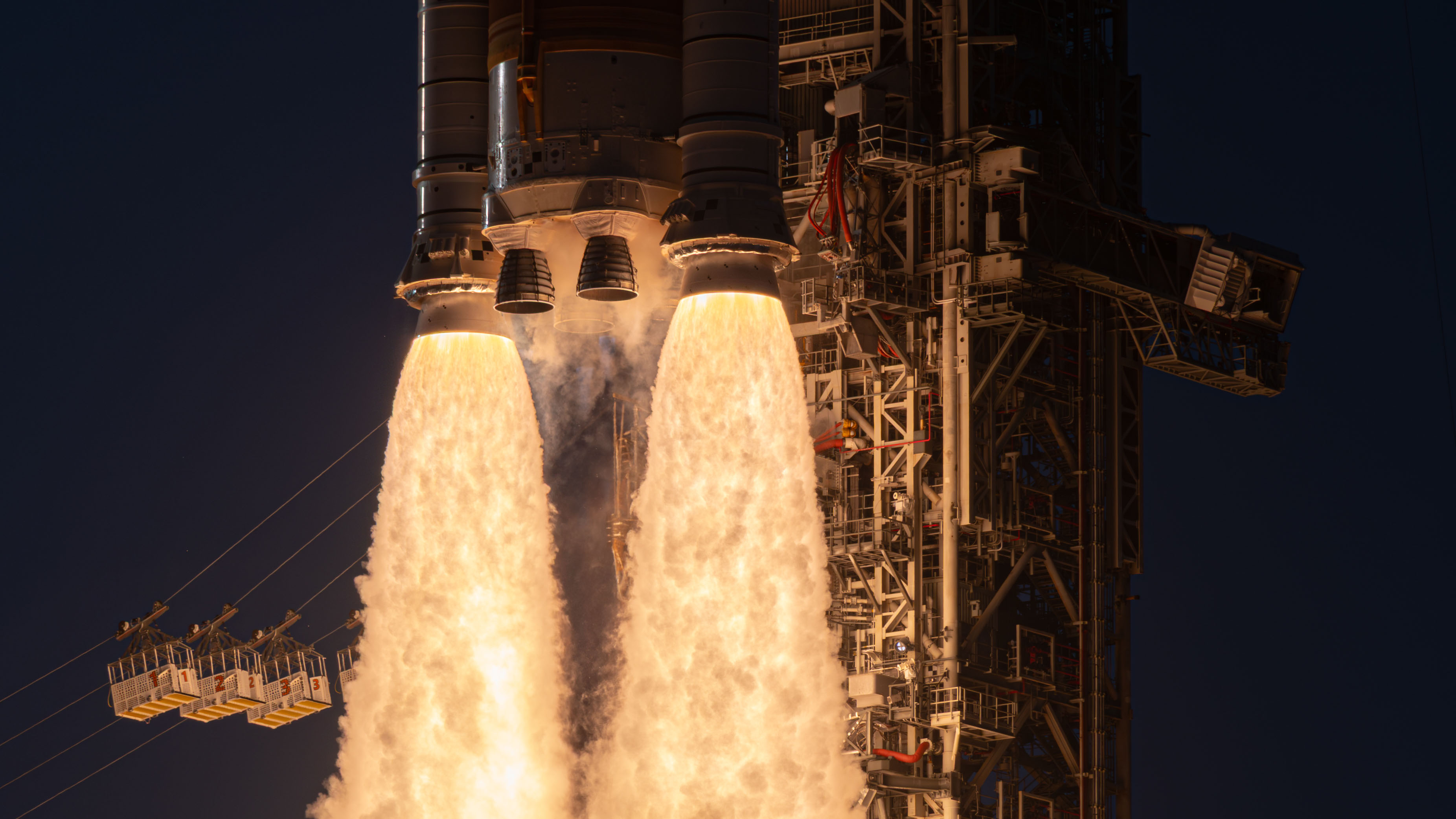 NASA&amp;rsquo;s Space Launch System (SLS) rocket and Orion spacecraft launch on the Artemis II test flight, Wednesday, Apr. 1, 2026, from Launch Complex 39B at NASA&amp;rsquo;s Kennedy Space Center in Florida. Commander Reid Wiseman, Pilot Victor Glover, and Mission Specialist Christina Koch from NASA, and Mission Specialist Jeremy Hansen from the CSA (Canadian Space Agency), will fly around the Moon and back to Earth during their approximately 10-day mission. Liftoff from Launch Complex 39B occurred at 6:35 p.m. EDT. Photo Credit: (NASA/John Kraus)