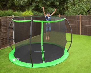 Image of green in-ground trampoline