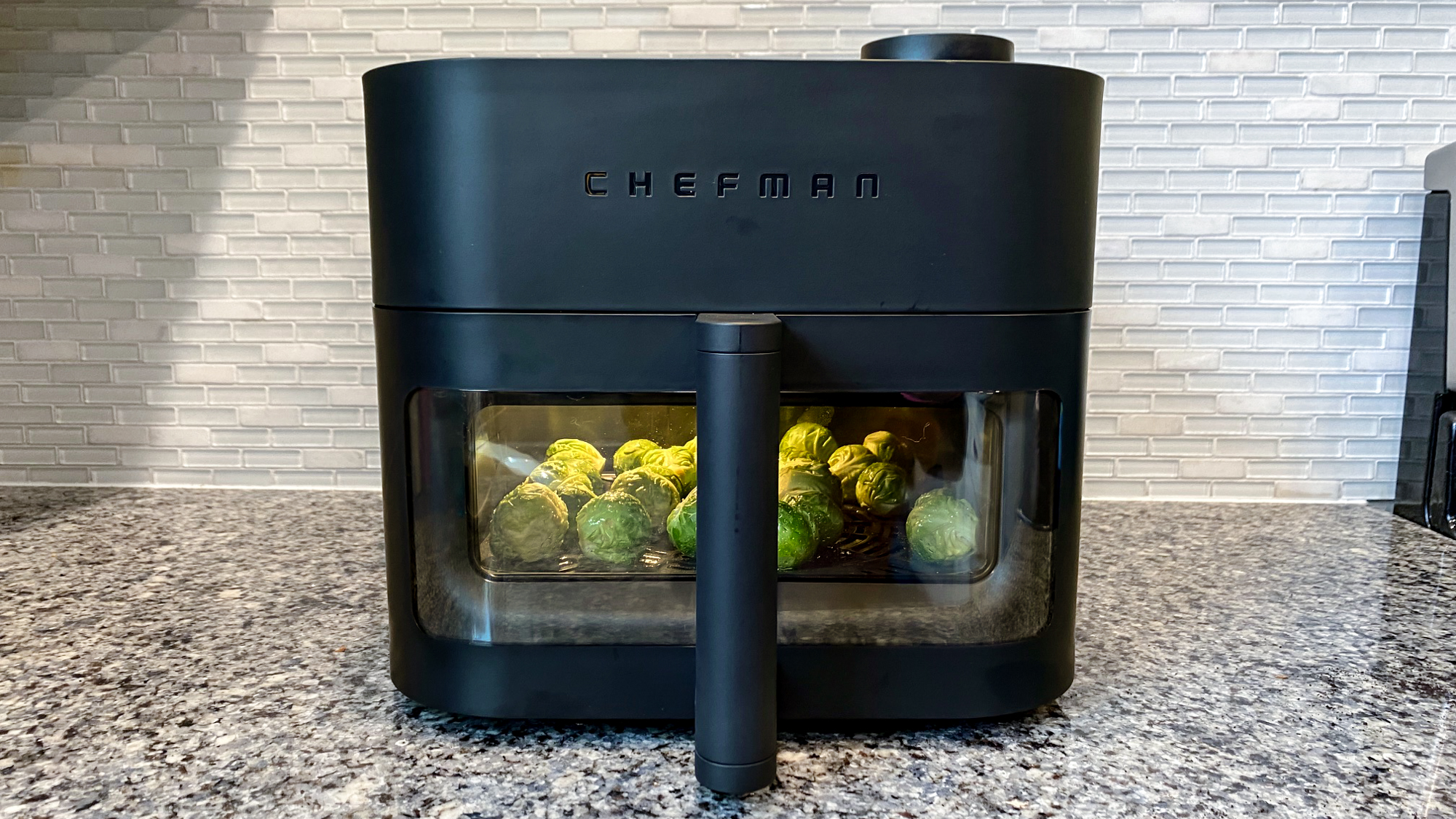 The Chefman Crispinator cooking brussel sprouts