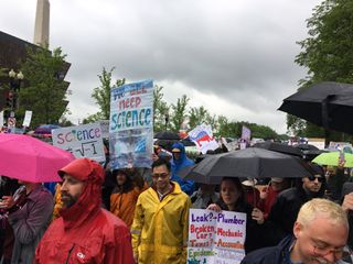 Scientists and science supporters braved rainy weather during the March for Science in Washington, D.C.