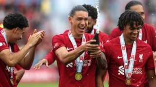 Fulham vs Liverpool live stream | Darwin Nunez of Liverpool celebrates with champagne during The Community Shield match between Manchester City and Liverpool at The King Power Stadium on July 30, 2022 in Leicester, England. 