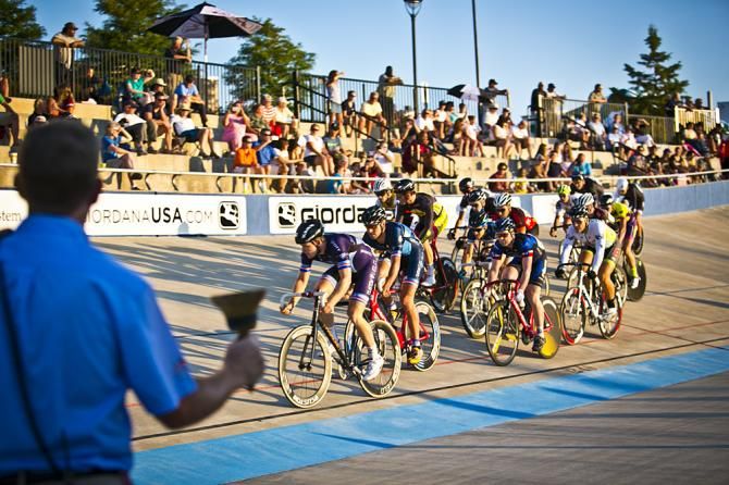 A USA Cycling Official rings the bell in the Men's Miss and Out National Championship race