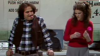 John Belushi and Gilda Radner in a sketch from Season 1 of SNL