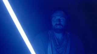 Ewan McGregor as Obi-Wan Kenobi with lightsaber in Obi-Wan Kenobi