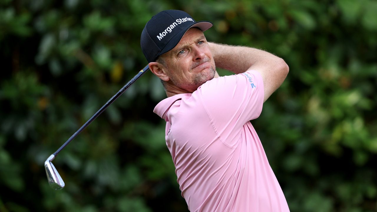 Justin Rose plays an iron shot at the BMW PGA Championship