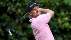 Justin Rose plays an iron shot at the BMW PGA Championship