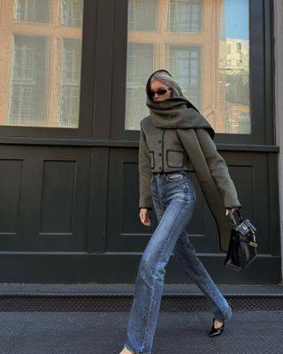 Influencer wearing skinny flared jeans.