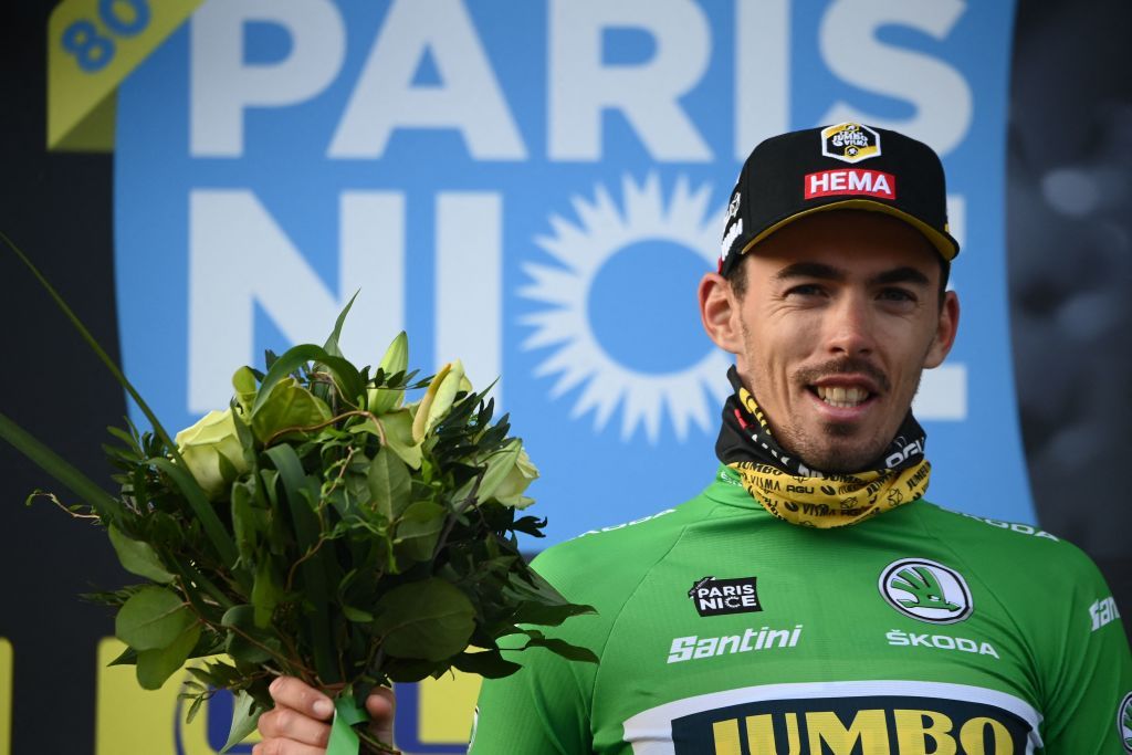 Stage winner JumboVismas French rider Christophe Laporte celebrates his green jersey of best sprinter on the podium at the end of the 1st stage of the 80th Paris Nice cycling race 160 km between ManteslaVille and ManteslaVille on March 6 2022 Photo by FRANCK FIFE AFP Photo by FRANCK FIFEAFP via Getty Images