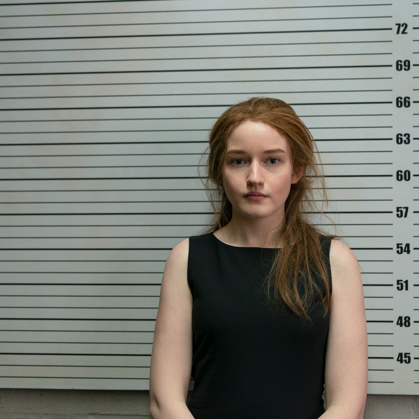 a still from a true crime series on Netflix, 'Inventing Anna'