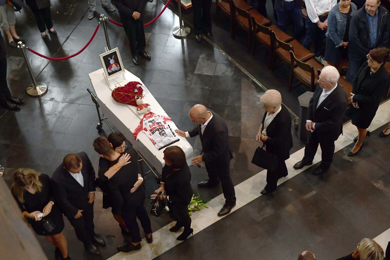 Lambrecht's Lotto Soudal jersey was draped over his coffin