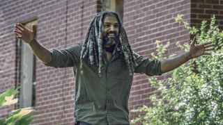 Ezekiel with arms stretched out on The Walking Dead