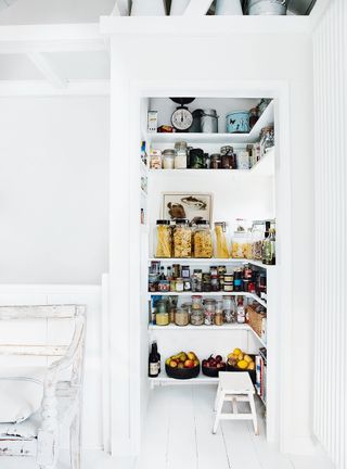 Pantry storage ideas in all white kitchen
